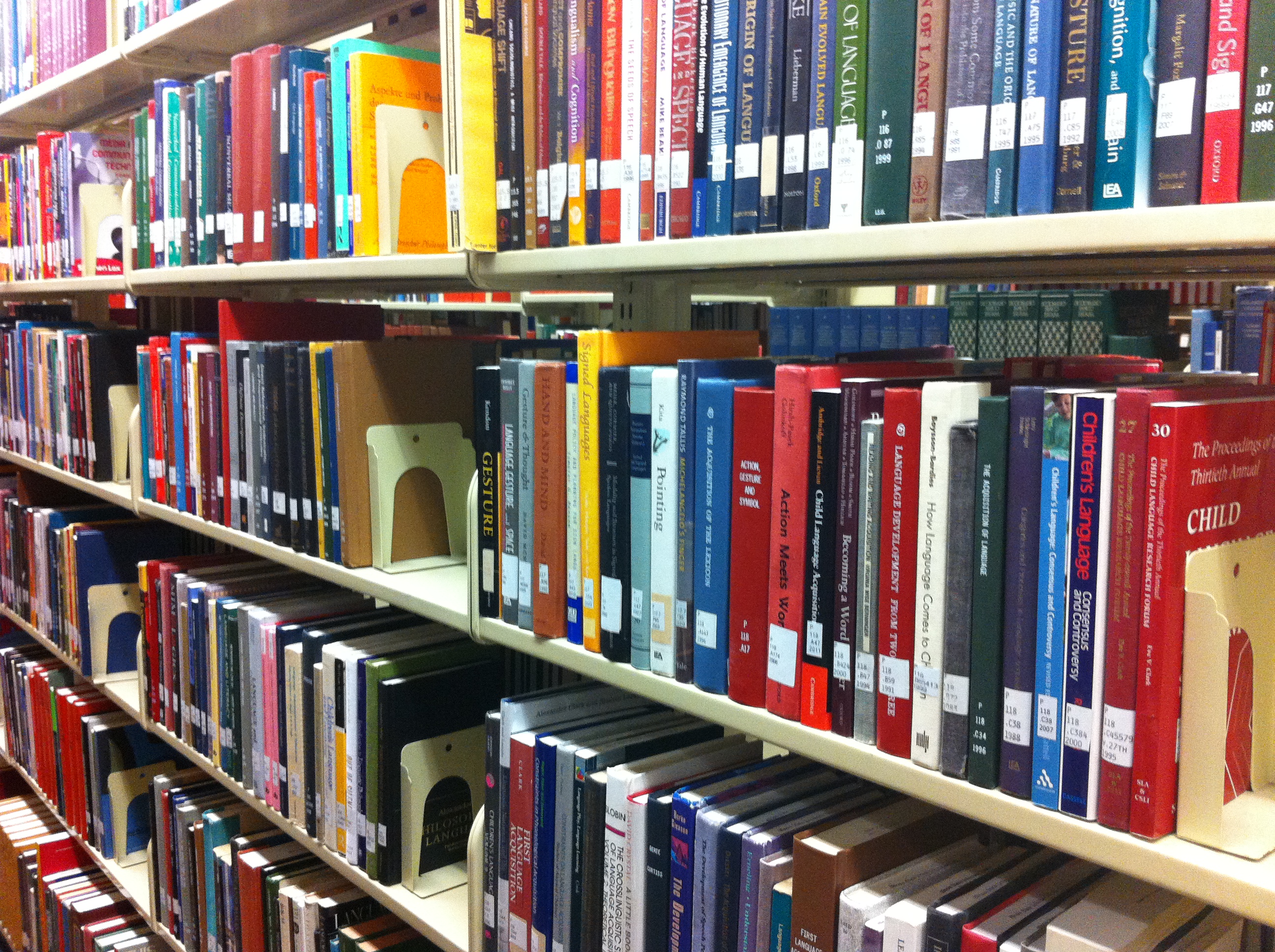 Shelves of books in a library.