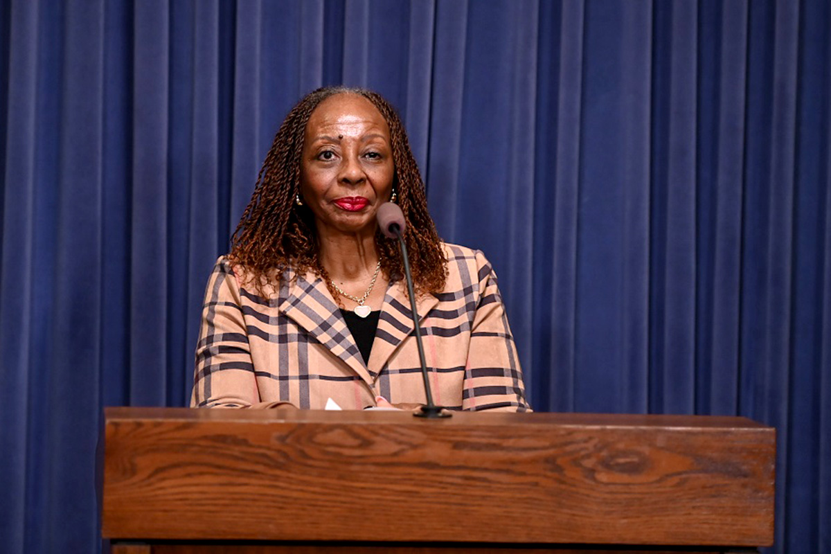 (Photo) Sen. Hunter speaks to reports in the Capitol's Blue Room